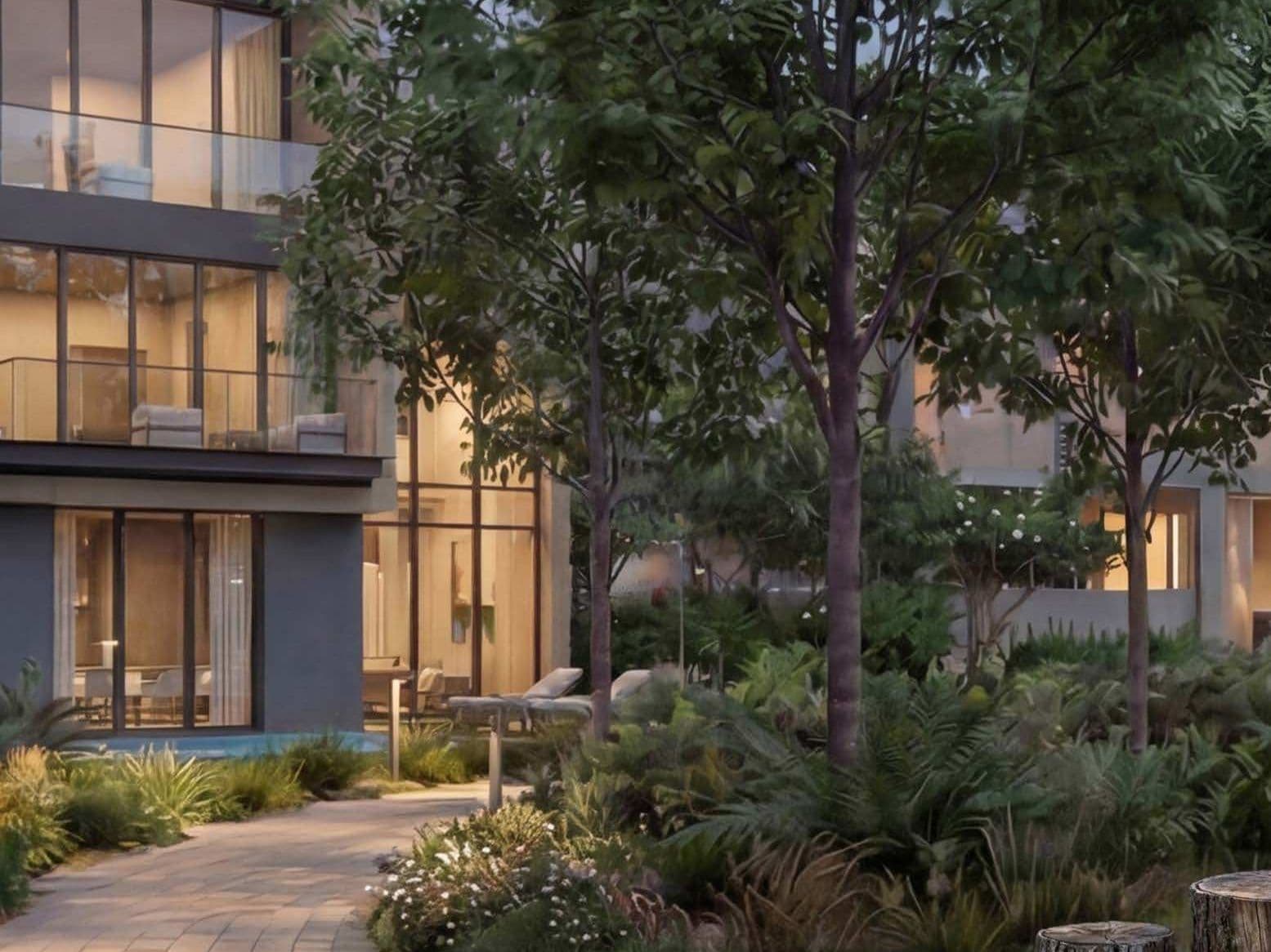 Landscaped entrance at dusk